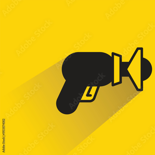 space laser gun icon with shadow yellow background