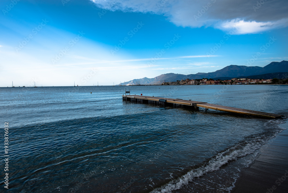 Fototapeta premium Pier extending into calm sea