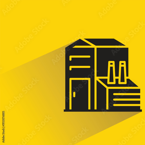 factory building icon with shadow on yellow background