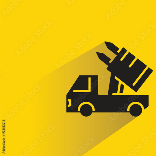army truck with missile launcher icon with shadow on yellow background