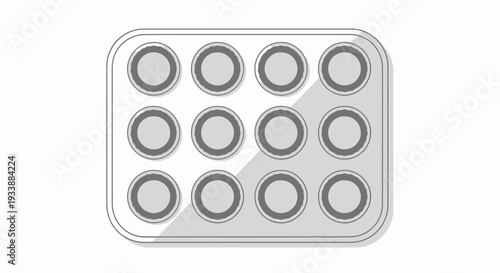 Baking tin with twelve circular indentations for cupcakes or muffins, isolated on a white background