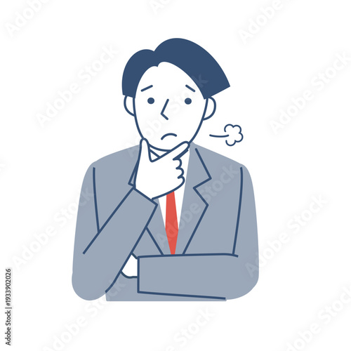 困った表情の男子学生の上半身