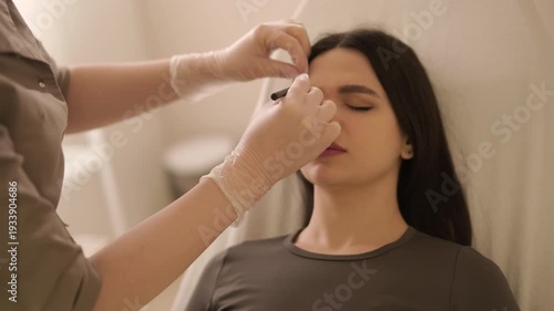 Professional mesotherapy treatment with vitamin injections on female face
