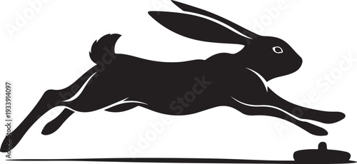 Black silhouette of a rabbit jumping over an obstacle
