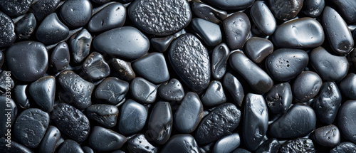 An entrancing scatter of dark, irregular lava rocks and pebbles, capturing the powerful and primal energy of volcanic formations.