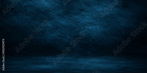 A dark blue grunge background captures a stormy night sky filled with clouds and fog over a motion wave of the deep sea
