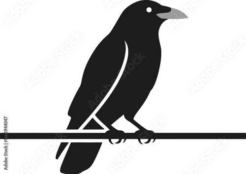 Black silhouette of a perched crow or raven sitting upon a thin horizontal.
