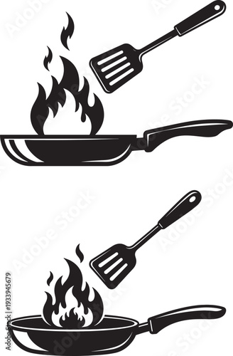 Two frying pans with spatulas on fire