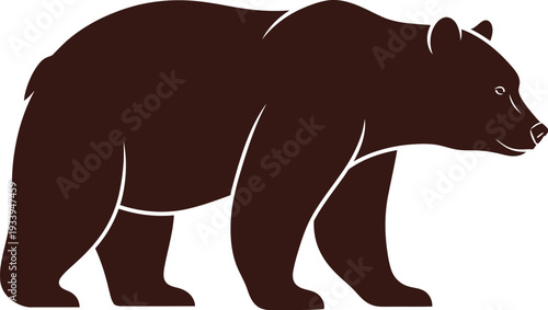 Brown bear silhouette stands in profile against a stark white background for.