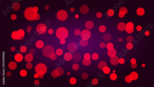 Red bokeh lights on dark background create festive and vibrant atmosphere
