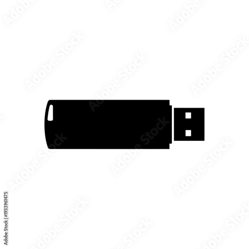 This isolated black and white USB flash drive is a portable digital memory storage device and removable computer accessory used to plug into a PC for data transfer and technology connection