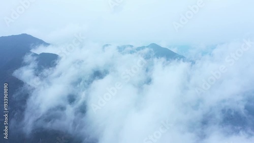 Wallpaper Mural 4K Aerial View of Majestic Primeval Forest with Misty Clouds and Changing Weather Patterns Torontodigital.ca