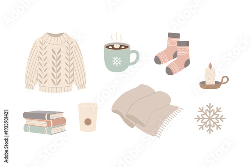 Cozy winter essentials collection featuring warm sweater, hot chocolate, and socks, alongside books, a candle, and a blanket for ultimate comfort.