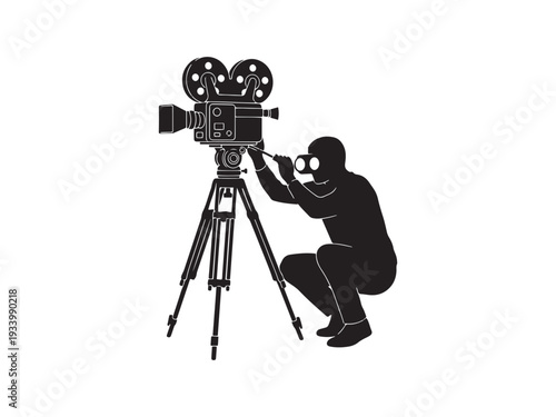 Silhouette of videographer operating old film camera on tripod.