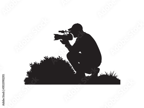 Sniper crouching in grass with rifle scope aiming.
