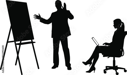Black silhouette of a businessman giving a presentation with a flipchart and a businesswoman using a laptop for corporate training and office meeting concepts.