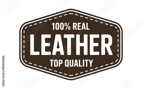 A brown and white label proclaiming 100 real leather and top quality