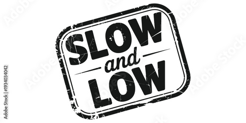 A distressed black stamp displaying the words slow and low in bold lettering