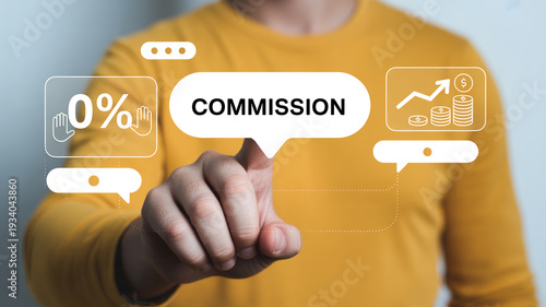 Man points to a digital display advertising zero percent commission rates and financial growth