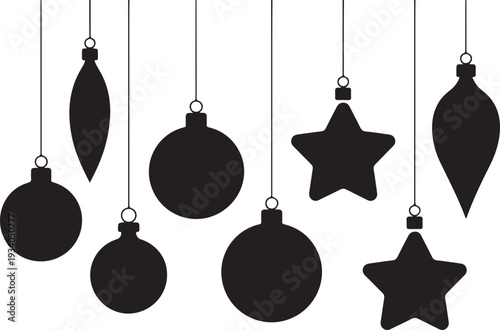 Black christmas ornaments hanging on strings