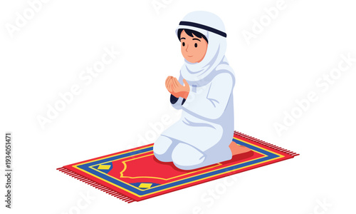 Young Muslim Boy Praying on a Red Prayer Mat
