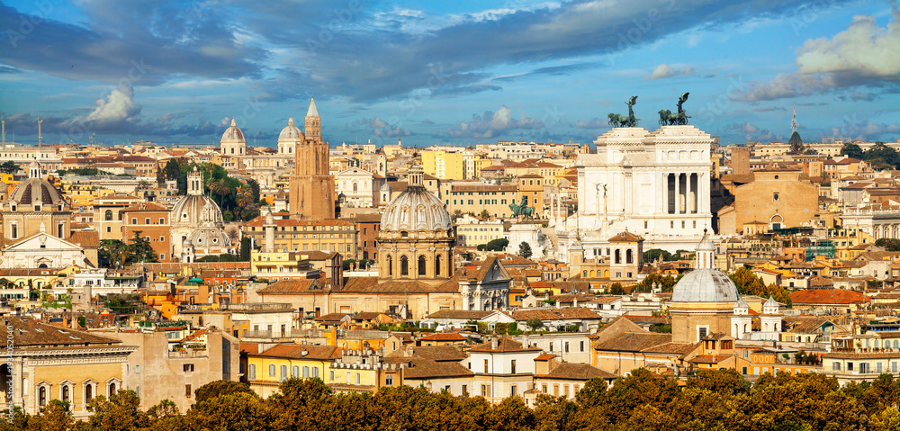 Naklejka premium Panoramic view of historic center of Rome, Italy. Roma is the capital of Italy. Cityscape of Rome in summer. Rome roofs view with ancient architecture in Italy. Rome architecture and landmark.