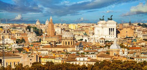 Panoramic view of historic center of Rome, Italy. Roma is the capital of Italy. Cityscape of Rome in summer. Rome roofs view with ancient architecture in Italy. Rome architecture and landmark.