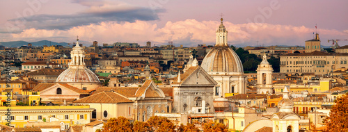 Panoramic view of historic center of Rome, Italy. Roma is the capital of Italy. Cityscape of Rome in autumn. Rome roofs view with ancient architecture in Italy. Rome architecture and landmark.