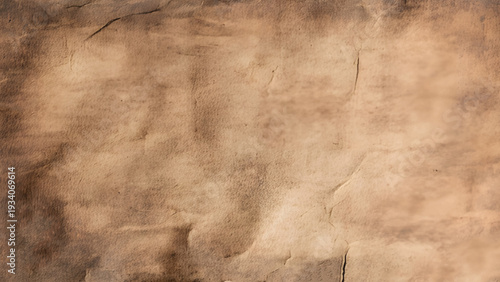 Grunge background of old vintage worn paper. Antique ancient parchment texture. 