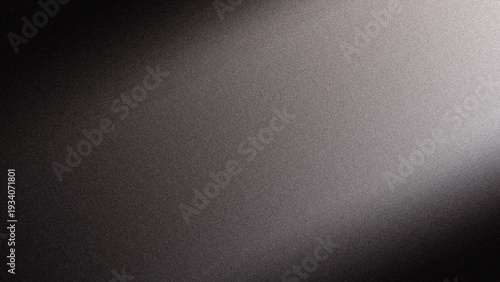 Grey gradient background with subtle texture and soft lighting effects creating a sleek and modern abstract design