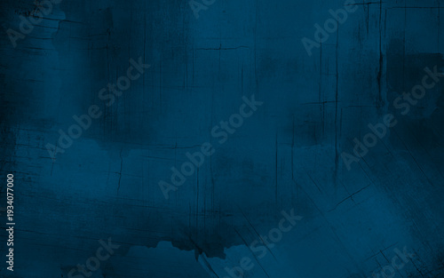Texture of dark blue decorative plaster or concrete with vignette. Abstract grunge background for design.