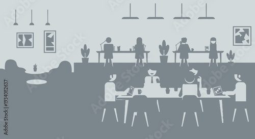 People working and socializing in a modern indoor office environment