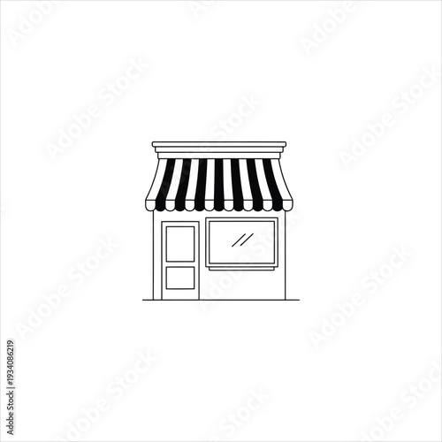 A small shop with a striped awning and a window