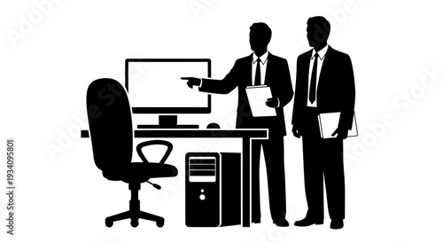 Two businessmen discuss work at a modern office desk with computer