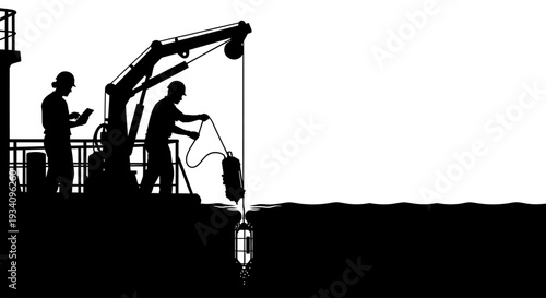 Two workers operate heavy machinery on an industrial site at night