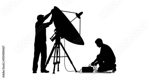 Two technicians setting up satellite dish on tripod outdoors