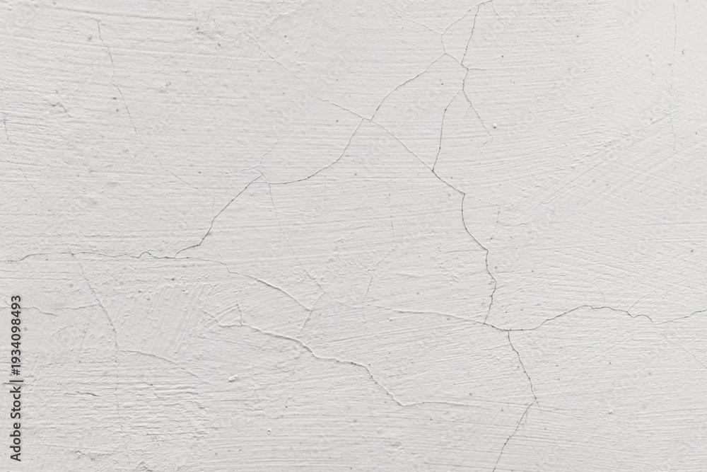 Obraz premium Minimalist white cracked wall texture with subtle plaster lines and weathered surface.