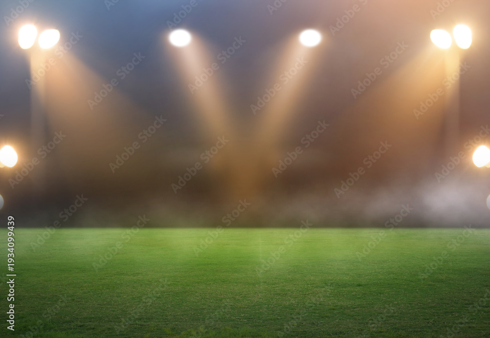 Fototapeta premium Green soccer field, bright spotlights, 