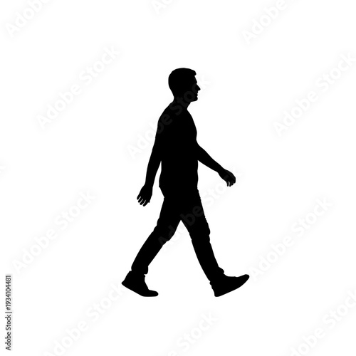 Silhouette of a man walking alone.