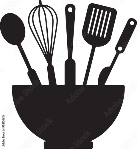 Black kitchen utensils in bowl cooking