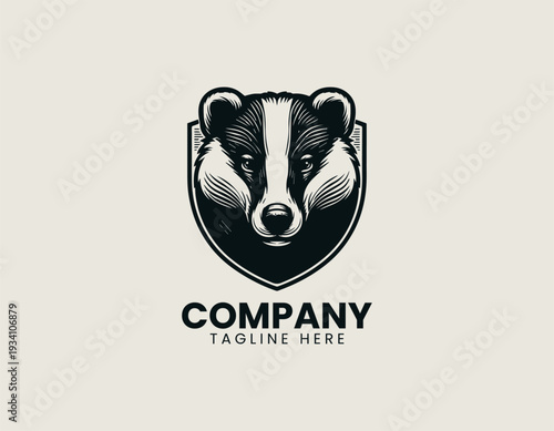 Detailed badger head in symmetrical frontal view is presented as bold monochrome vector logo on clean white background
