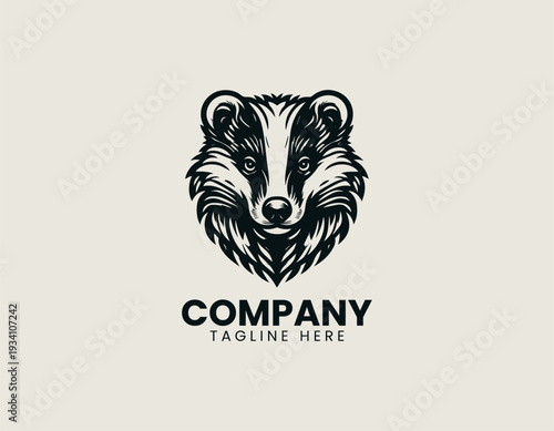 Detailed badger head in symmetrical frontal view is presented as bold monochrome vector logo on clean white background