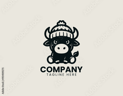 Cute cartoon bull wearing beanie hat with angry expression is presented as bold monochrome vector logo on clean white background