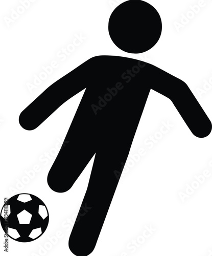 Silhouette of a soccer player in action kicking or controlling the ball during a game