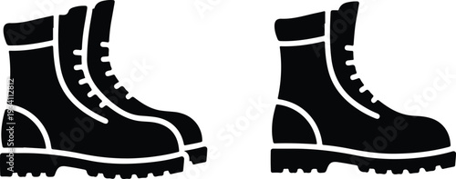 Two black boots one with a second one slightly behind Both have laces a defined sole and top