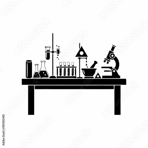 Scientific laboratory equipment setup on a table for experiments and research.