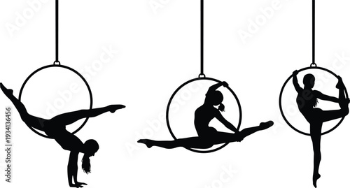 Black silhouettes of female aerialists performing graceful acrobatic poses and splits on hanging circus hoops against a plain white background