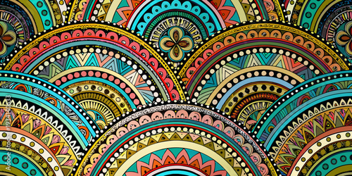 Colorful concentric arches create a vibrant and intricate bohemian pattern