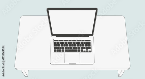 A laptop computer sitting on a desk with its screen open and keyboard visible