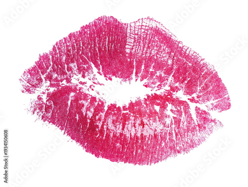 Close-up of a pink lipstick imprint on a black background